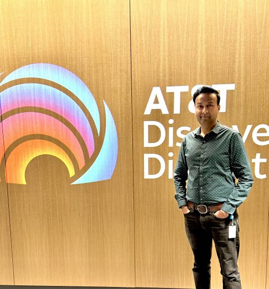 Kartik in front of the AT&T Discovery District sign