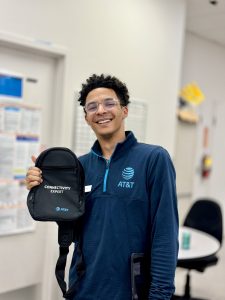 Team member with backpack