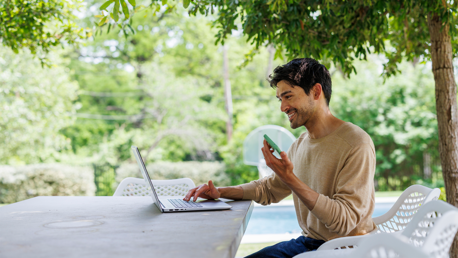 Man works at a laptop