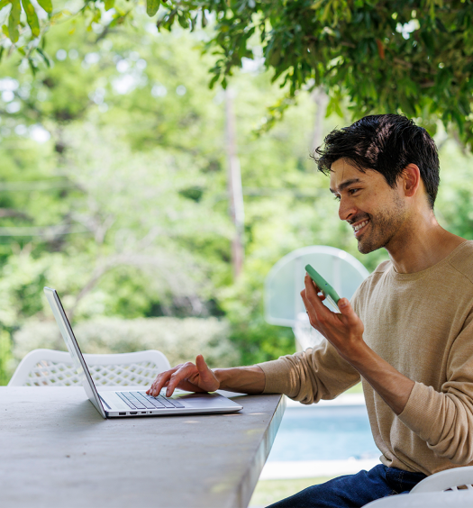 Man works at a laptop