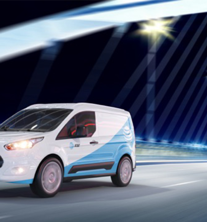 AT&T van drives across a bridge