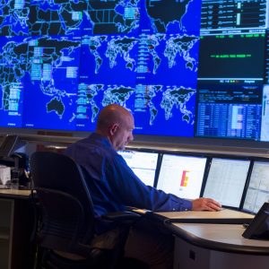 Technology employee at computer in Cybersecurity