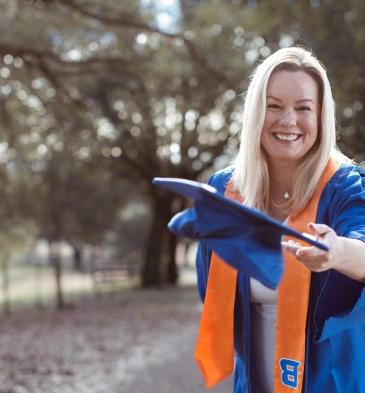 Cher in graduation gown