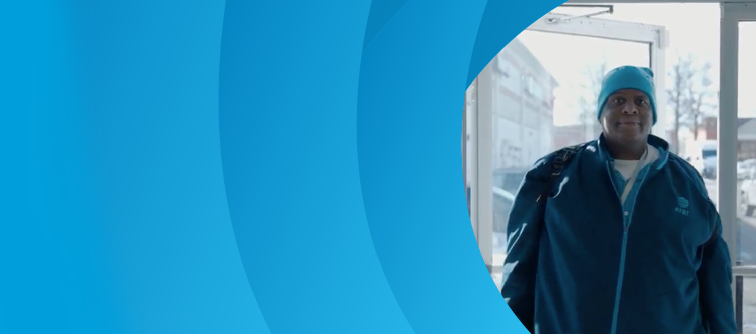 Blue aperture patter curves around a photo of Rick in AT&T attire entering a retail store