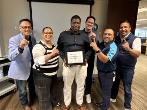 Louie and and team celebrate