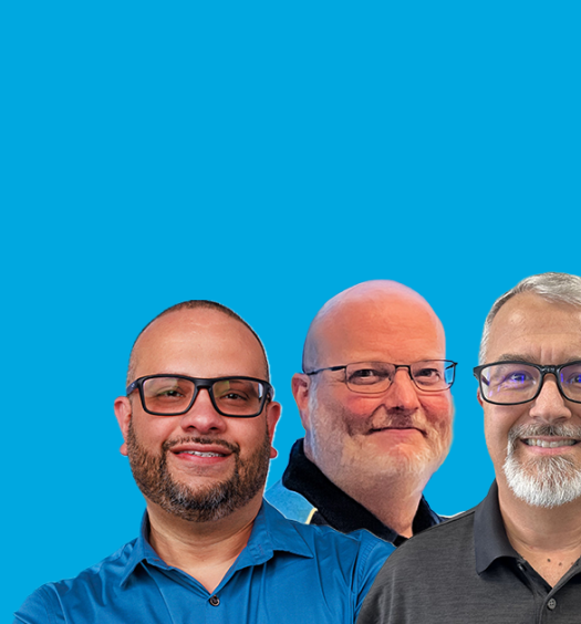 Four men in business and AT&T attire
