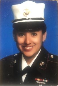 Woman in Marine Corps dress attire