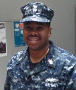 Man in Navy fatigues